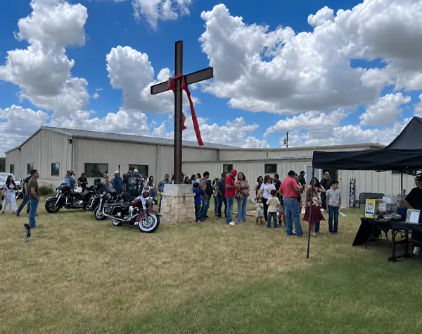 Greener Grass On God's Side team and community members gathered at a church fundraiser