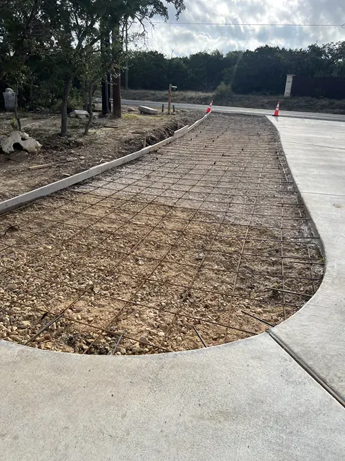 Landscaping project in progress with edging and planting beds
